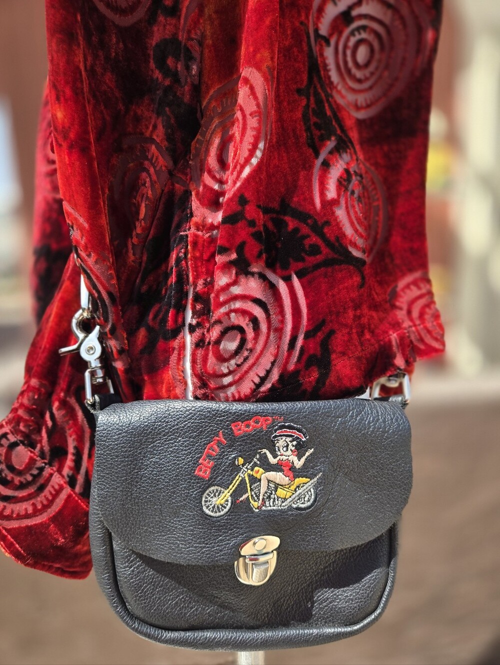 Betty Boop Black Crossbody Bag with Embroidered Yellow Bike Accent